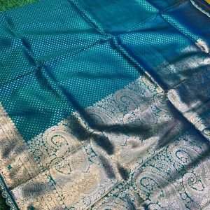 Soft quality silk saree in Green Colour with extra laid border & Blouse Piece.